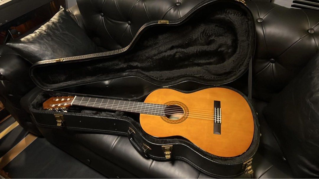 Yamaha C-40 Classical Guitar (Category: Musical Instruments) located in Quezon City. Submitted by monique_aguilar (Listing ID 1442737964, Image 1). Description: - Natural wood finish acoustic guitar - Comes with a protective hard case - Case features a textured exterior - Plush interior lining for added protection - Ideal for both practice and performance - Ready for a new home!.