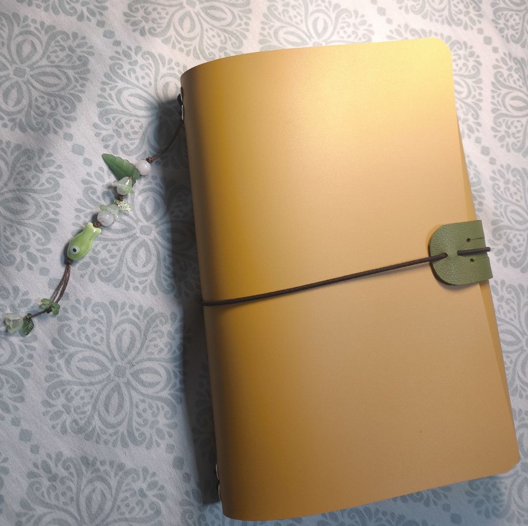 Yellow Mango Leather Journal with Fish Charm (Category: Stationery & School Supplies) located in Quezon City. Submitted by clarenzeann (Listing ID 1442865241, Image 3). Description: Hi! I just created this mango-themed Journal! 🥭 Inclusions: Leather Journal Cover 1 Long Charm 2 Blank Inserts Freebie Stickers :D Dm me for more details :3 .
