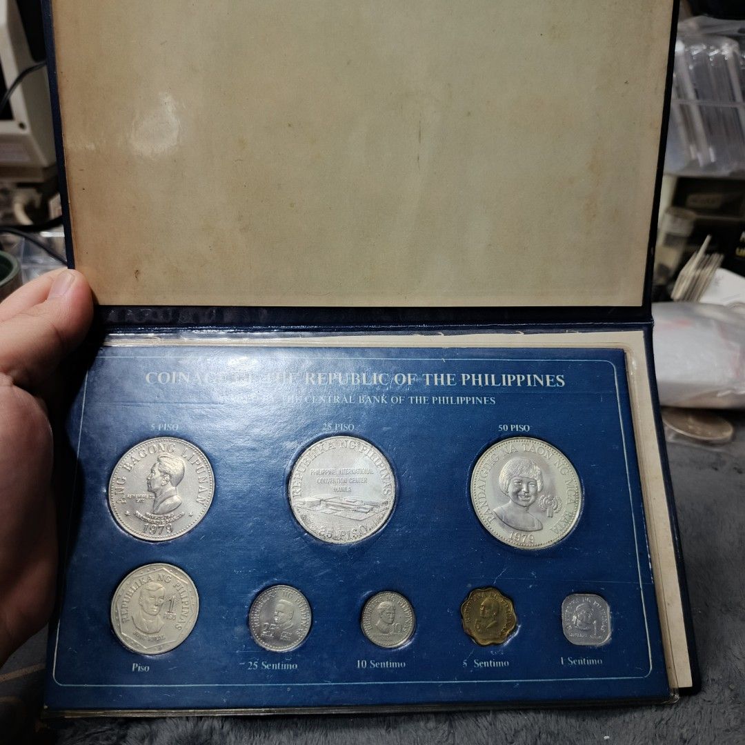 1979 Philippine Commemorative Set (Category: Currency) located in Quezon City. Submitted by Coiners (Listing ID 1447077605, Image 1). Description: - Complete collection of coins from the Republic of the Philippines. - Includes denominations from 1 Sentimo up to 1 Peso. - Comes in an elegant presentation case. - Ideal for coin collectors and enthusiasts of Philippine currency..