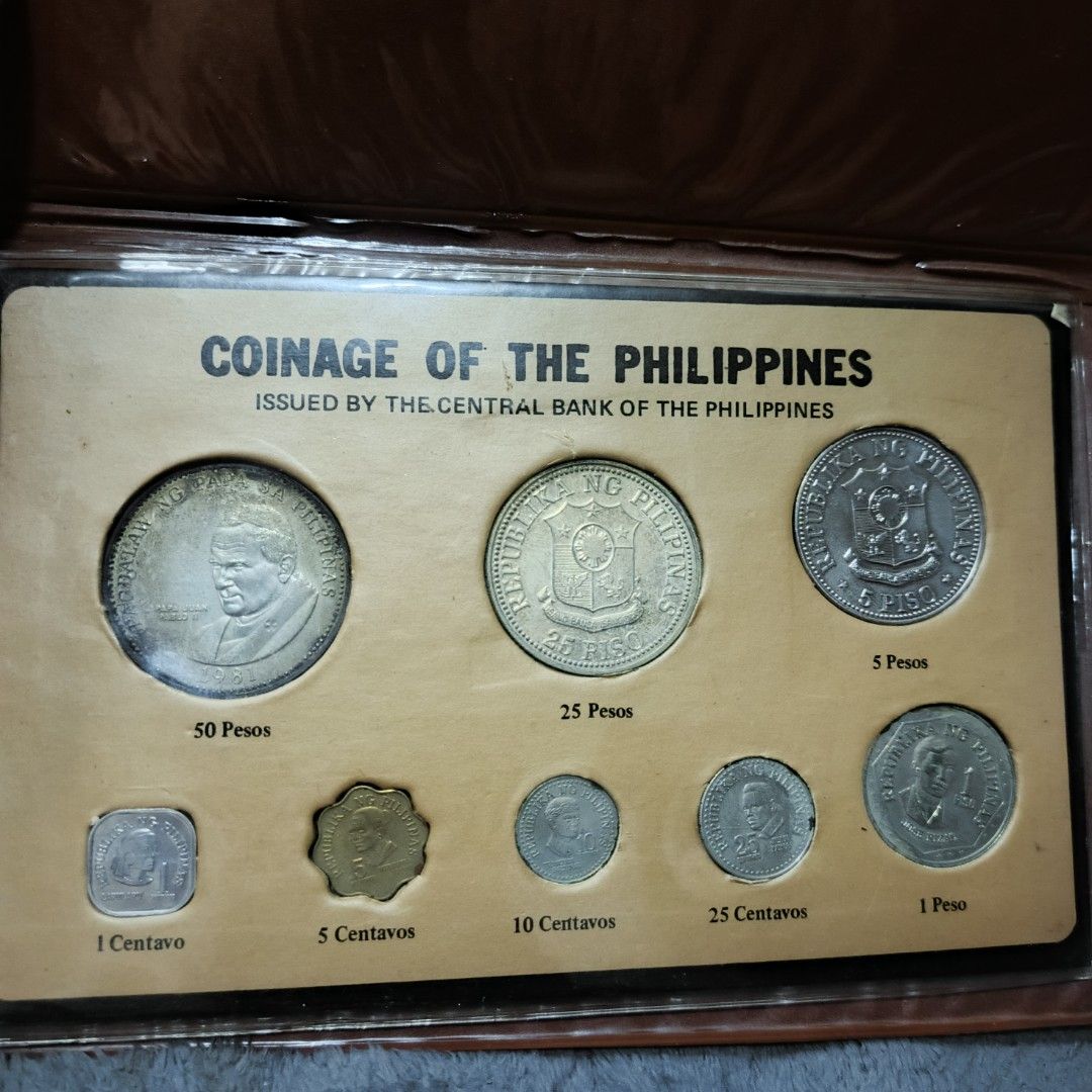 1981 Philippine Commemorative Coin Set (Category: Currency) located in Quezon City. Submitted by Coiners (Listing ID 1447077542, Image 1). Description: - Complete collection of Philippine coins issued by the Central Bank. - Includes: 1 Centavo, 5 Centavos, 10 Centavos, 25 Centavos, 1 Peso, 5 Pesos, 25 Pesos, and 50 Pesos. - Features the special 25 Peso coin. - Comes in an elegant presentation case. - Ideal for coin enthusiasts and collectors..