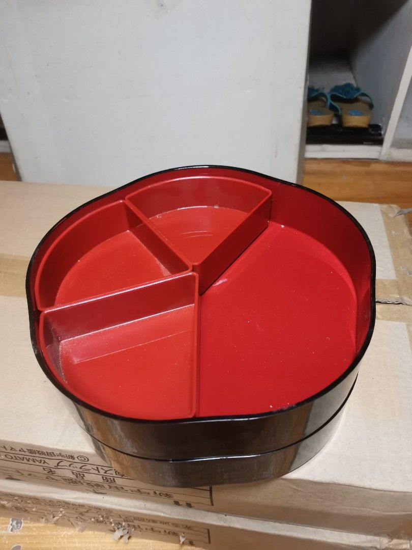 2 tier Japanese Jubako box (Category: Dinnerware & Cutlery) located in Marikina City. Submitted by cheaponsales (Listing ID 1447072013, Image 2). Description: not used but some viaible scratches on closer look from storage... A Jubako (重箱) is a traditional, multi-tiered Japanese box used for storing, transporting, and serving food. Usually featuring two to four stackable layers and a lid, these decorative boxes—often finished with elegant lacquer