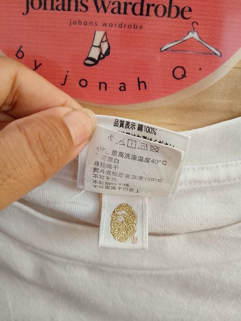 A Bathing Ape Baby Milo Chicken Graphic Tee (Category: Tshirts & Polo Shirts ) located in Manila. Submitted by jonahq.9 (Listing ID 1446975995, Image 2). Description: dimes 21x29L - White A Bathing Ape (BAPE) T-shirt - Features classic Baby Milo characters - Adorable chicken graphic - Made from 100% cotton - Ideal for everyday casual wear - Check tags for material confirmation.