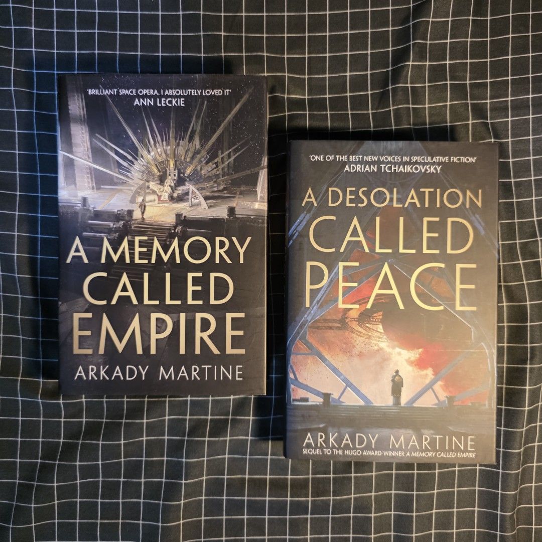 A Memory Called Empire & A Desolation Called Peace by Arkady Martine (Category: Storybooks) located in Carmona. Submitted by demonfog (Listing ID 1447017361, Image 1). Description: - Selling Arkady Martine's 'A Memory Called Empire' and 'A Desolation Called Peace'. - Both are hardcover editions. - Highly acclaimed sci-fi novels. - Ideal for fans of space opera and political intrigue. - Grab both for your next exciting read!.