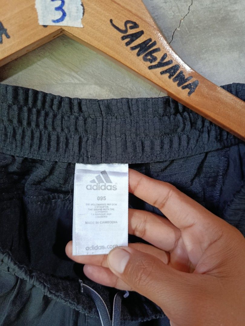 Adidas Black Shorts with White Stripes (Category: Activewear) located in Kalamansig. Submitted by skone1996 (Listing ID 1446970746, Image 3). Description: - Classic black Adidas shorts - Small size - 30-32 Waistline - 16 Length - 9.8/10 Color rate - Issue Last pic. nabura na ang logo pero solid parin pang takbo - Features iconic white three stripes on the side - Elastic waistband with adjustable drawstring for a perfect fit - Versatile for sports