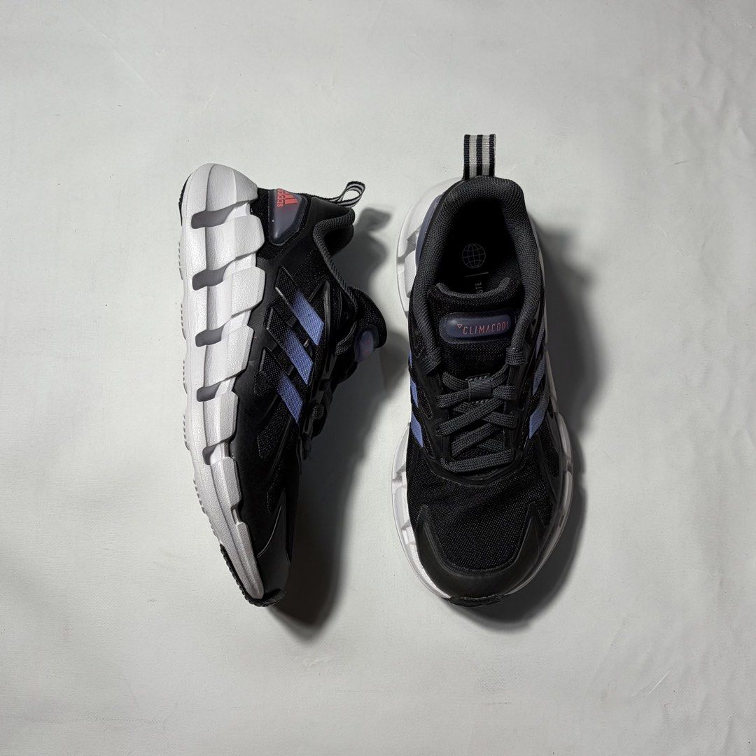 Adidas Climacool Running Shoes Black Purple (Category: Sneakers) located in Baguio. Submitted by suffering (Listing ID 1447100370, Image 1). Description: - Adidas Climacool running shoes - Color: Black with purple accents - Lightweight and breathable design - Perfect for running, training, or everyday wear - Ready for a new owner.