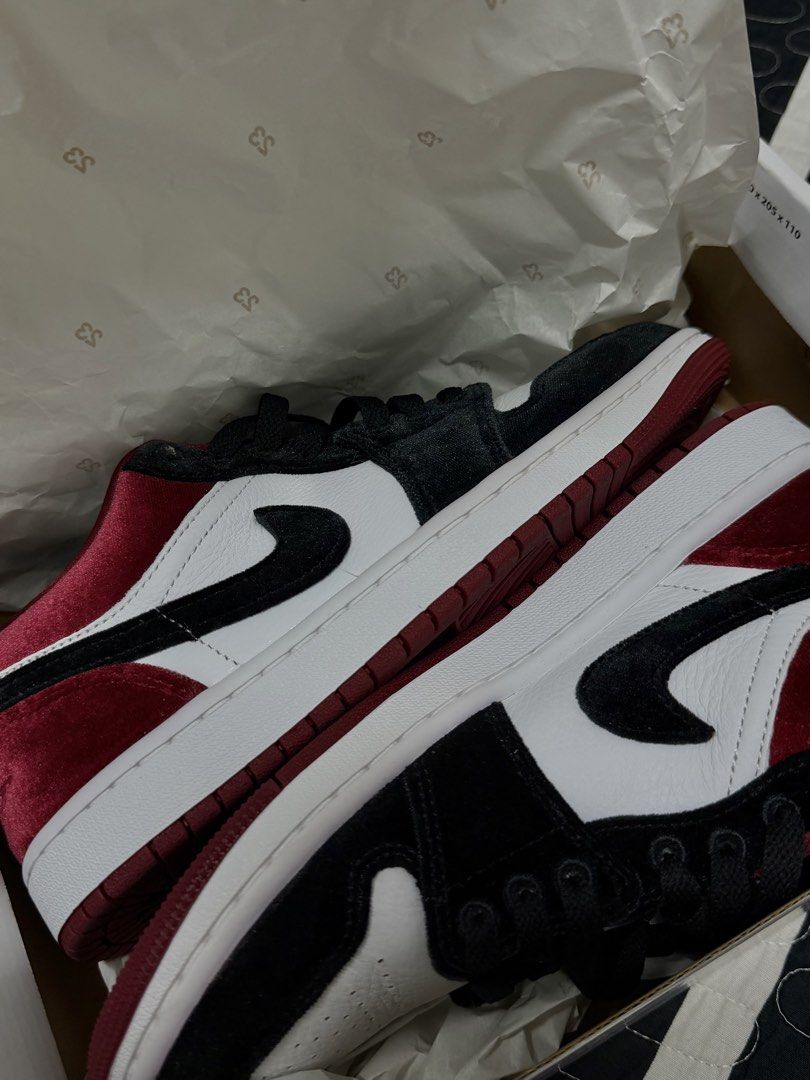 Air Jordan 1 Low SE Velvet Black Red White US 8 (Category: Sneakers) located in Puchong. Submitted by annieyshaw (Listing ID 1447076663, Image 1). Description: - Air Jordan 1 Low SE - Unique Velvet Material - Classic Black, Red, and White Colorway - Size US 8 (UK 5.5, EUR 39, CM 25) - Brand New In Original Box with Tissue Paper - A must-have for any sneaker enthusiast!.