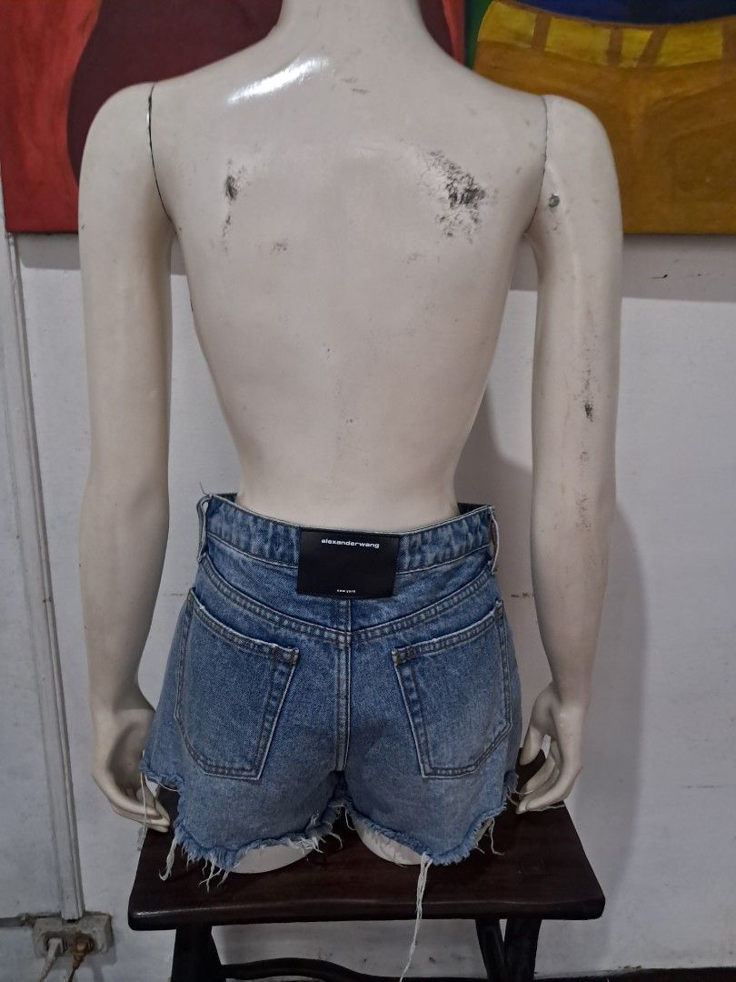 Alexander Wang Bite High Rise Denim Shorts Size 26 (Category: Shorts) located in Manila. Submitted by msaludo (Listing ID 1447013650, Image 2). Description: - Alexander Wang Bite High Rise Denim Shorts - Size: 26 - Color: Classic blue wash - Features: Distressed hem - Origin: Made in USA from imported materials.