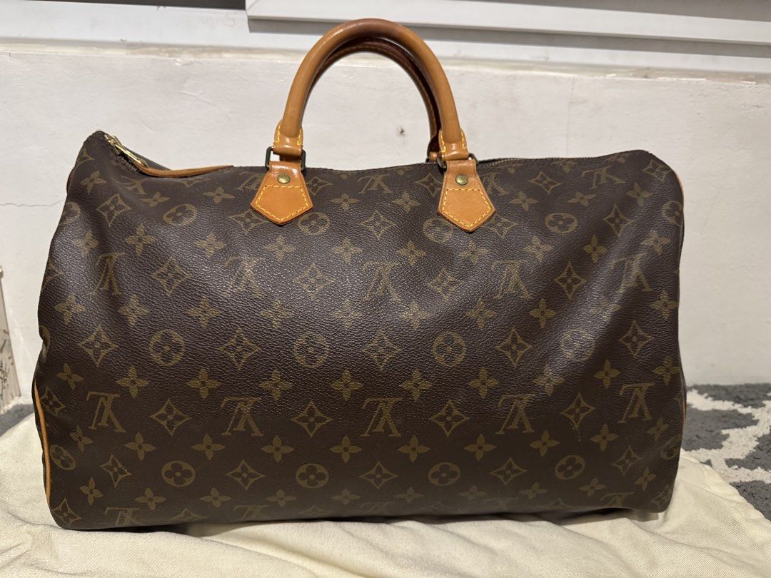 AUTHENTIC Louis Vuitton Monogram Speedy 40 (Category: Luxury Bags & Wallets) located in Pasig City. Submitted by acffashion31 (Listing ID 1446958075, Image 1). Description: AUTHENTIC Lv Speedy 40 - Classic Louis Vuitton Speedy Bag - Monogram Canvas - Vachetta Leather Trim and Handles - Zipper Closure - Made in France - Shows some signs of wear on leather and handles but still excellent condition -Money back guaranteed if proven fake.