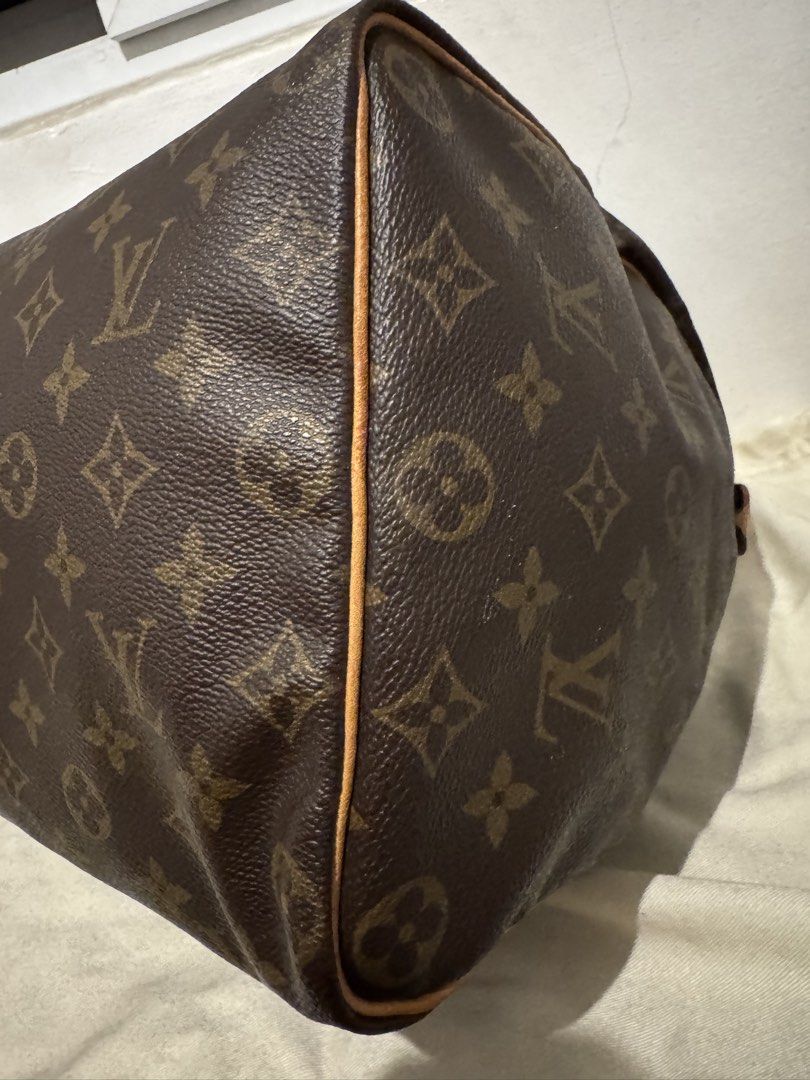 AUTHENTIC Louis Vuitton Monogram Speedy 40 (Category: Luxury Bags & Wallets) located in Pasig City. Submitted by acffashion31 (Listing ID 1446958075, Image 3). Description: AUTHENTIC Lv Speedy 40 - Classic Louis Vuitton Speedy Bag - Monogram Canvas - Vachetta Leather Trim and Handles - Zipper Closure - Made in France - Shows some signs of wear on leather and handles but still excellent condition -Money back guaranteed if proven fake.