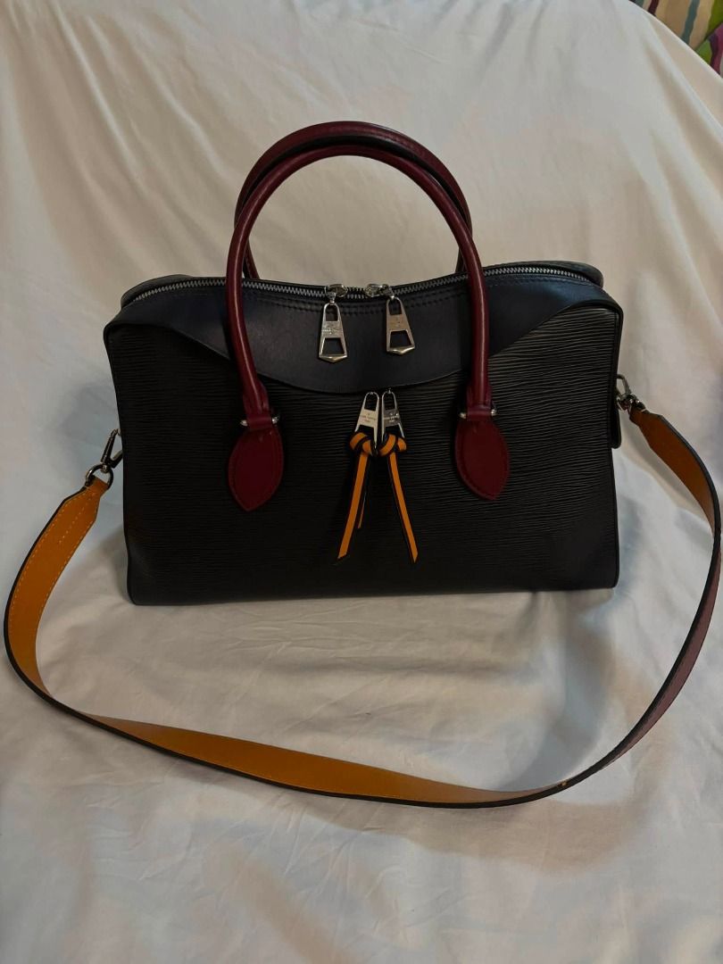 Authentic Louis Vuitton Tuileries Bag (Category: Luxury Bags & Wallets) located in Taguig. Submitted by curatedbyb.ph (Listing ID 1447041878, Image 2). Description: Authentic Louis Vuitton Tuileries Bag In excellent condition - material is in Epi leather which is durable rain or shine 🥰 Inclusions: dustbag, receipt, box, paper bag.