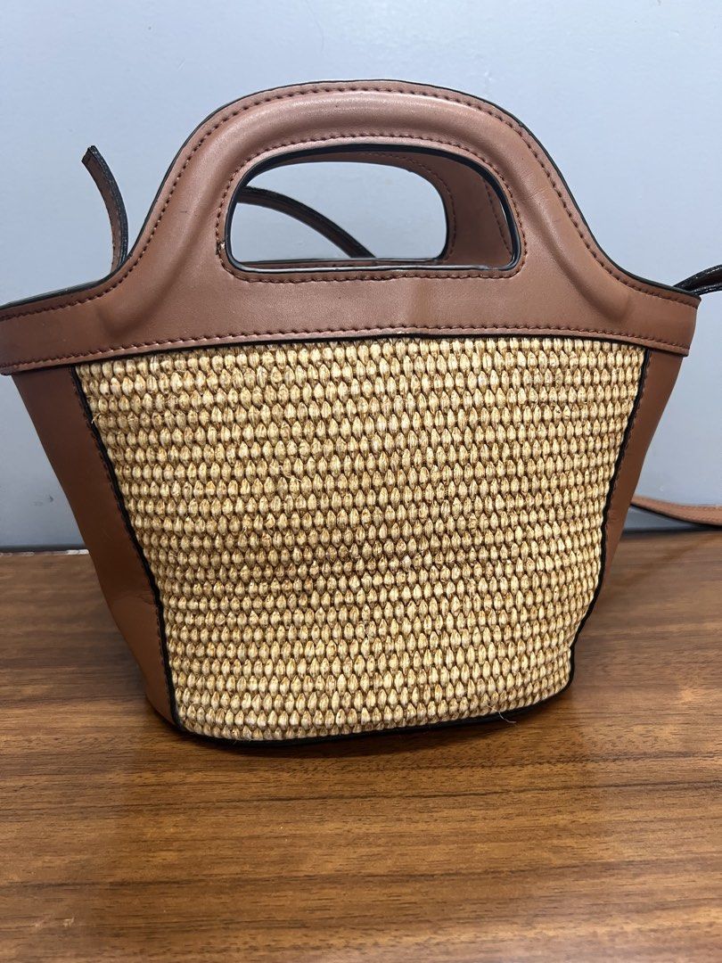 Authentic Marni Micro Tropicalia bag (Category: Luxury Bags & Wallets) located in Cagayan de Oro. Submitted by riggstuffs (Listing ID 1447066714, Image 2). Description: ➡️ Guaranteed authentic Marni Tropicalia leather tote bag ➡️ Made in Italy ➡️ Embroidered logo to the front, clean interior ➡️ Top handle with long adjustable sling ➡️ Gold tone hardware ➡️ Sign of use is faded color at the bottom area ➡️ No other inclusion Disclaimer: Riggstuffs 