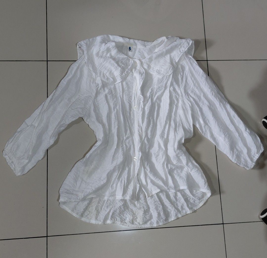 Baby Doll White Coquette Button-Up Blouse (Category: Blouses) located in Manila. Submitted by niknacks_ (Listing ID 1446924769, Image 1). Description: 🛍 INFO: - baby doll / coquette button up polo - can fit S-L - rfs: declutter - notice: manage expectations + few stains, but will wash before shipping - pm for more deets 📦 MOP & MOD: - transfer through QR InstaPay (GCash, Maya, etc) - payment first, no return / refund - lalamove or j&t (booked b