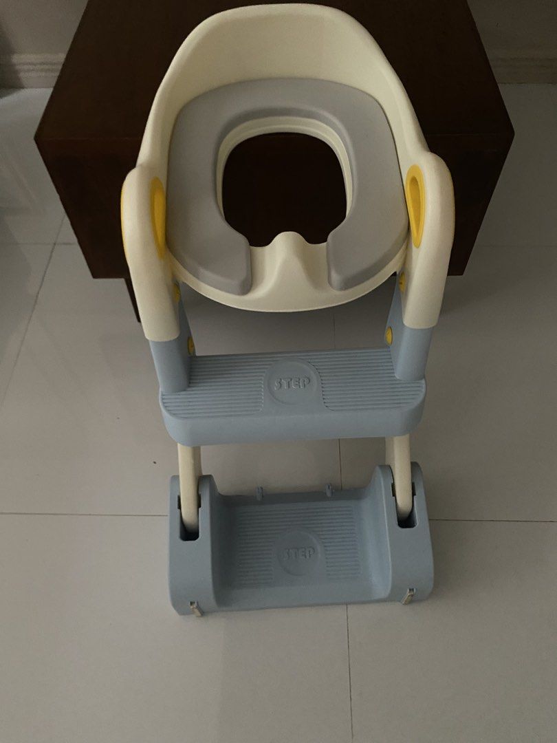 Baby Potty Training Seat with Step Stool Ladder (Category: Toilet Training) located in Paranaque City. Submitted by abrilalvin (Listing ID 1447006832, Image 1). Description: - Easy potty training seat for toddlers - Built-in step stool and ladder for independence - Comfortable padded seat - Fits most standard toilets - Encourages self-toilet learning - Ideal for home or travel.