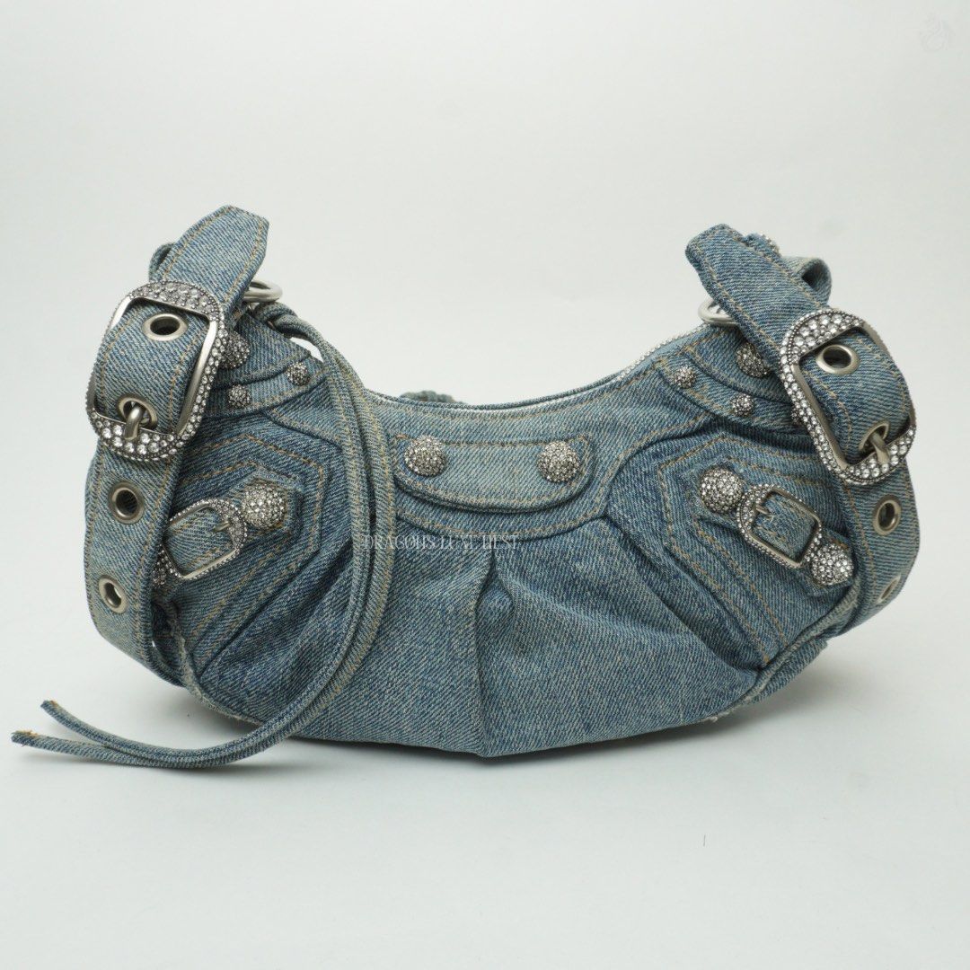 Balenciaga Denim Le Cagole (Category: Luxury Bags & Wallets) located in Taguig. Submitted by dluxenest (Listing ID 1446951117, Image 1). Description: Last price posted Inclusion: dust bag, care booklets, receipt, tag You may follow us on IG : dluxenest FB : Dragons Luxe Nest.