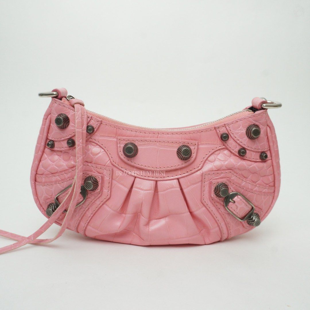 Balenciaga Le Cagole (Category: Luxury Bags & Wallets) located in Taguig. Submitted by dluxenest (Listing ID 1446952492, Image 2). Description: Last price posted You may follow us on IG : dluxenest FB : Dragons Luxe Nest.