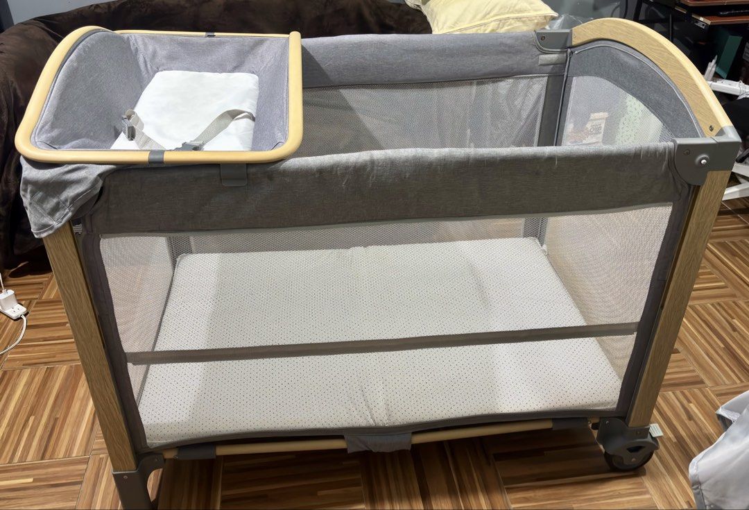 Bambina Crib (Category: Cots & Cribs) located in Manila. Submitted by ayelzy (Listing ID 1446933604, Image 3). Description: Original Price: 7900 PHP This crib grows with your baby! Ginamit namin to when my baby was a newborn, unable to sit up yet, until he’s able to stand. This crib actually taught my baby to stand. Could be used as: * DIAPER CHANGER A removable DIAPER CHANGER is included * CO SLEEPER Slide down one side of the crib and attach it