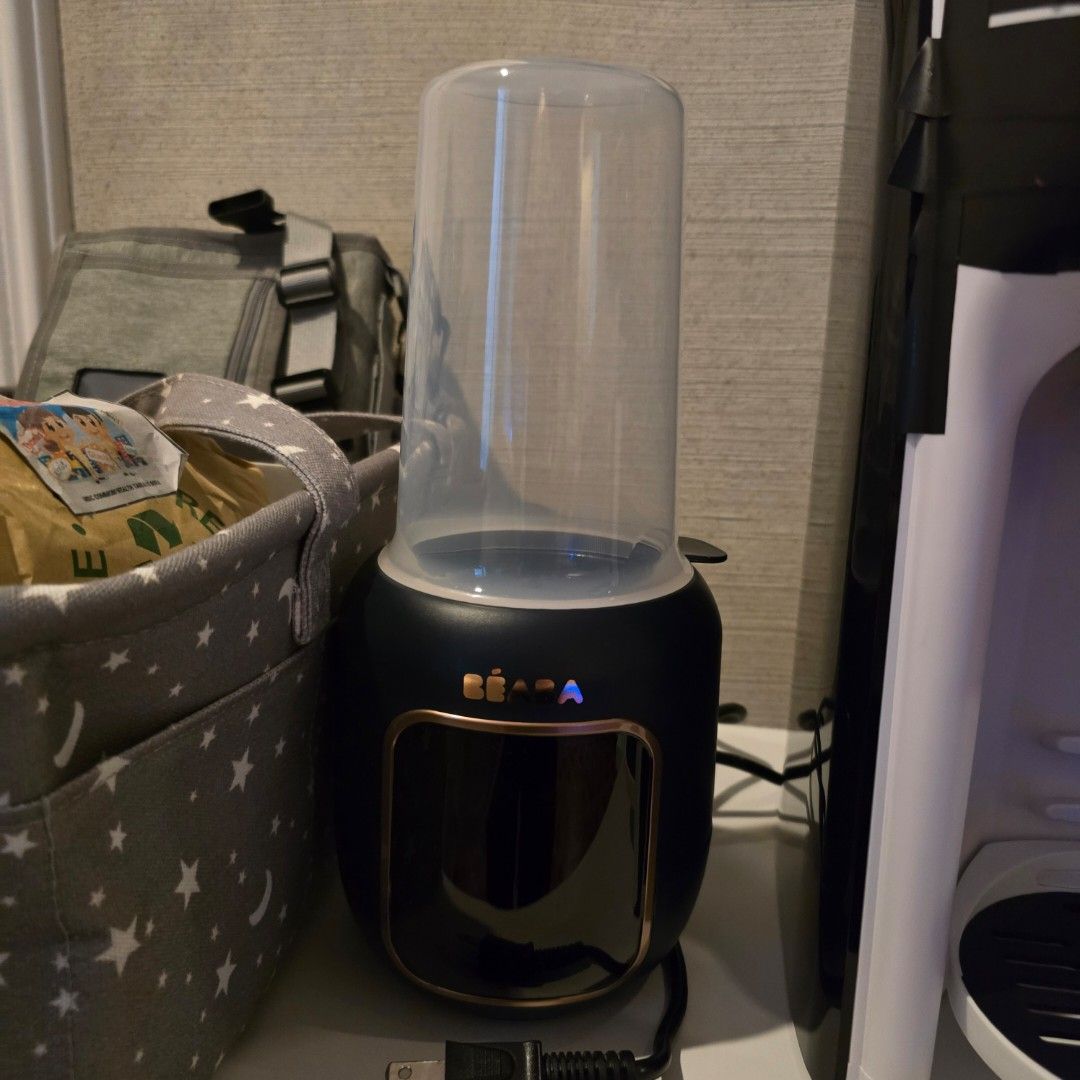 Beaba 5-in-1 Milk Warmer (Category: Breastfeeding & Bottle Feeding) located in Manila. Submitted by cat.dee (Listing ID 1447031989, Image 1). Description: 5-in-1 Multifunction Bottle Warmer: Water bath mode Defrost mode Babyfood mode Fast mode Sterilization mode.