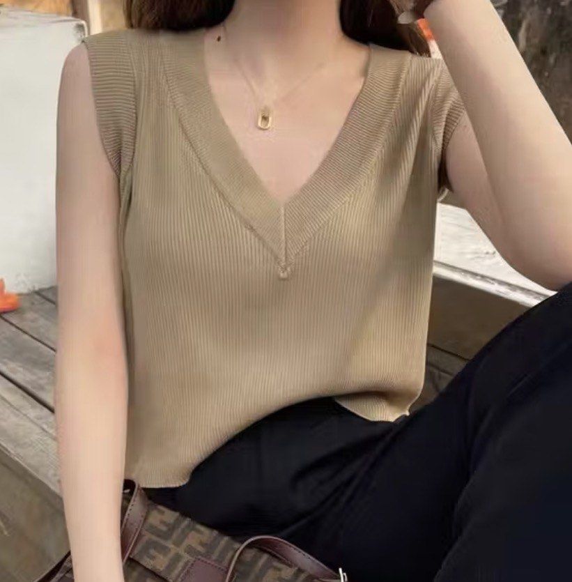 Beige V-neck Sleeveless Knit Top (Category: Sleeveless) located in Quezon City. Submitted by ianne.declutter (Listing ID 1447065556, Image 3). Description: RFS: impulse buy of other colors color beige doesnt suit me CONDITION: once used only - Casual beige knit top - V-neckline with ribbed texture - Sleeveless design - Versatile for layering or wearing alone - Comfortable for everyday wear - Pairs well with trousers or skirts.