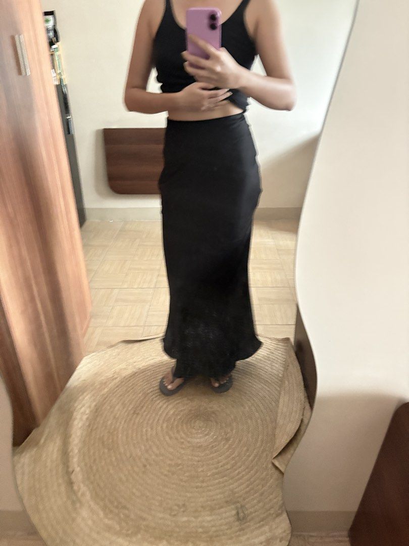 Black Maxi Skirt with Lace Hem (Category: Skirts) located in Manila. Submitted by _foryou (Listing ID 1446938054, Image 2). Description: - Elegant long black skirt - Features a delicate lace detail at the hem - Slip skirt style for a chic look - Comfortable and flowy design - Perfect for dressing up or down - Effortlessly pairs with various tops.