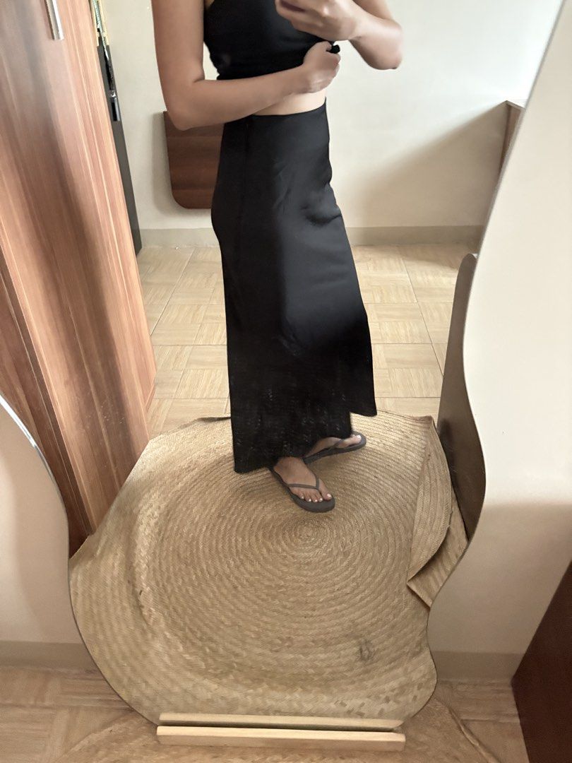 Black Maxi Skirt with Lace Hem (Category: Skirts) located in Manila. Submitted by _foryou (Listing ID 1446938054, Image 3). Description: - Elegant long black skirt - Features a delicate lace detail at the hem - Slip skirt style for a chic look - Comfortable and flowy design - Perfect for dressing up or down - Effortlessly pairs with various tops.