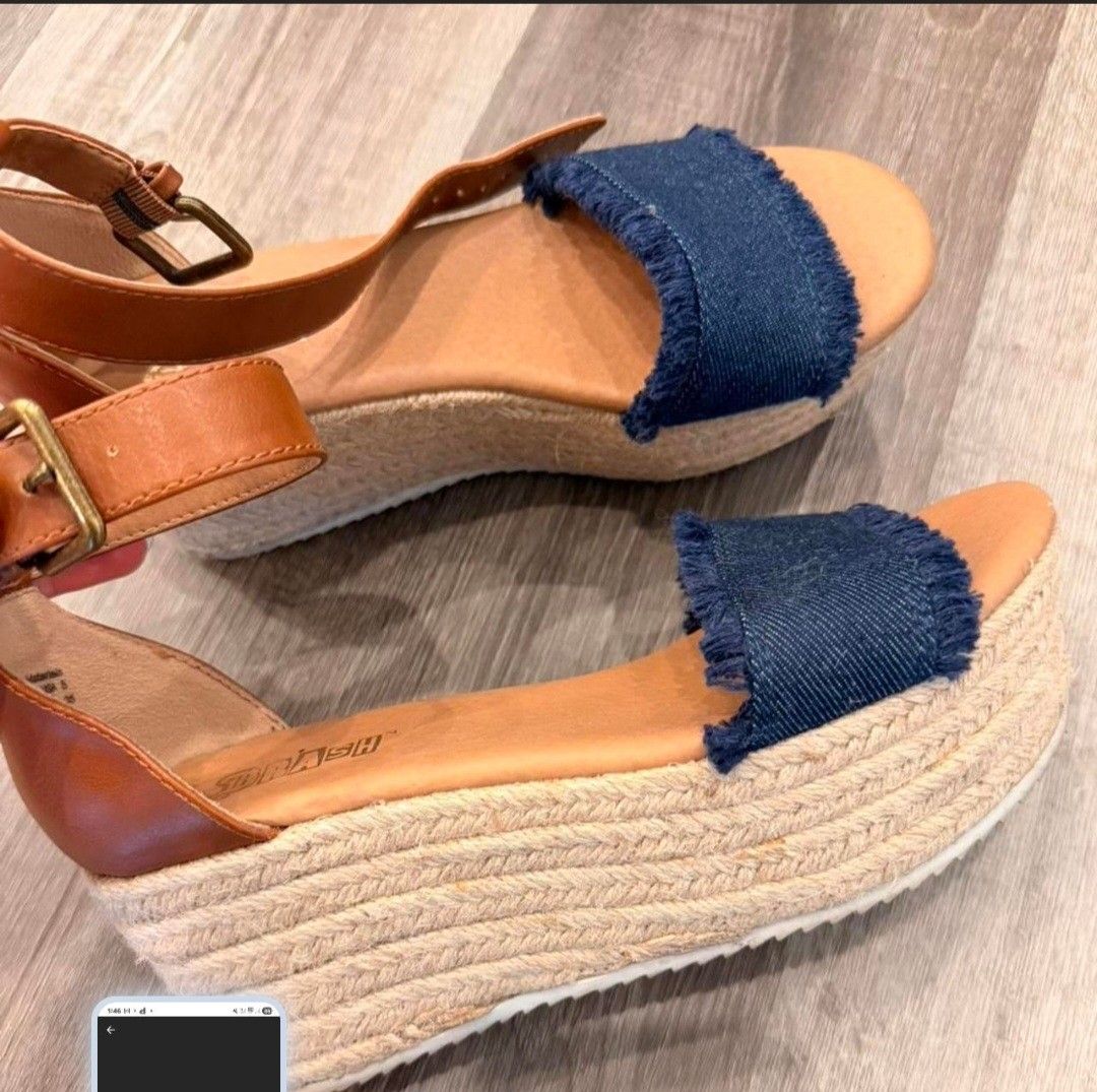 Brash Denim & Espadrille Wedge Sandals (Category: Wedges) located in Pasig City. Submitted by chinitafrommanila (Listing ID 1447099467, Image 2). Description: Brash ( fr USA) condition is lightly used but with cleaning it can look good as new - Cute wedge sandals - Denim front straps & tan ankle straps. SO FUN AND QUIRKY! :) - Espadrille sole - Size: 5 US but fits 5.5, maybe even 6 - Perfect for summer outfits - Comfortable wedge heel for easy wa