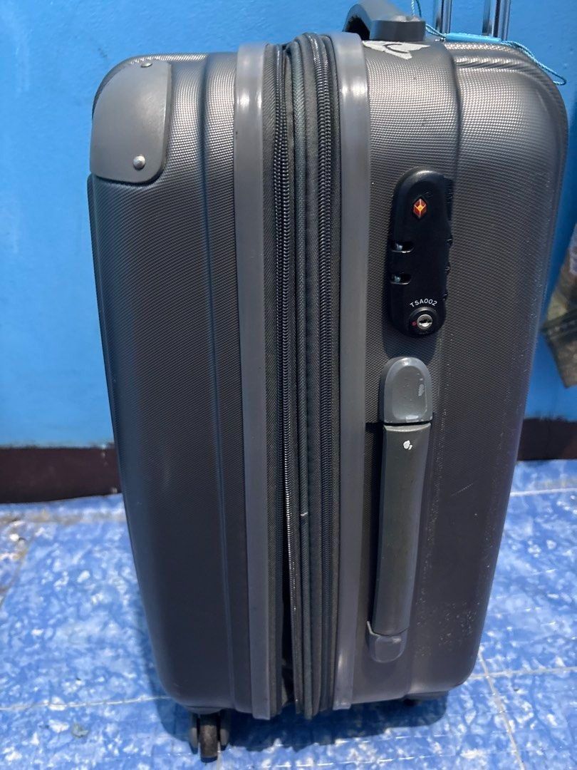 Ferie Grey Hardshell Cabin Luggage with TSA Lock (Category: Luggage) located in Manila. Submitted by offtherack_mnl (Listing ID 1446931121, Image 3). Description: - Grey hardshell cabin luggage - Built-in TSA lock for security - Interior straps to keep belongings in place - Smooth-gliding 4-wheel spinner system - Ideal for short trips and carry-on use - Note: Minor scuffs on wheels due to normal use - 50% of the sales will help and support cancer
