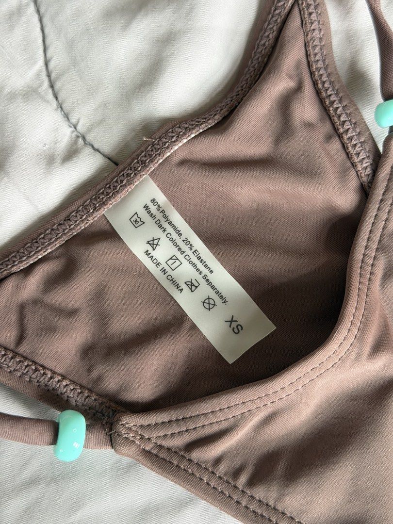 Brown bikini with bead detail (Category: Bikinis & Swimsuits) located in Cebu City. Submitted by itemsbysarah (Listing ID 1446964511, Image 2). Description: Shein Brown Cheeky bikini with bead details Size XS Brand new RFS: decluttering ❕Low ballers will not be entertained ❕.