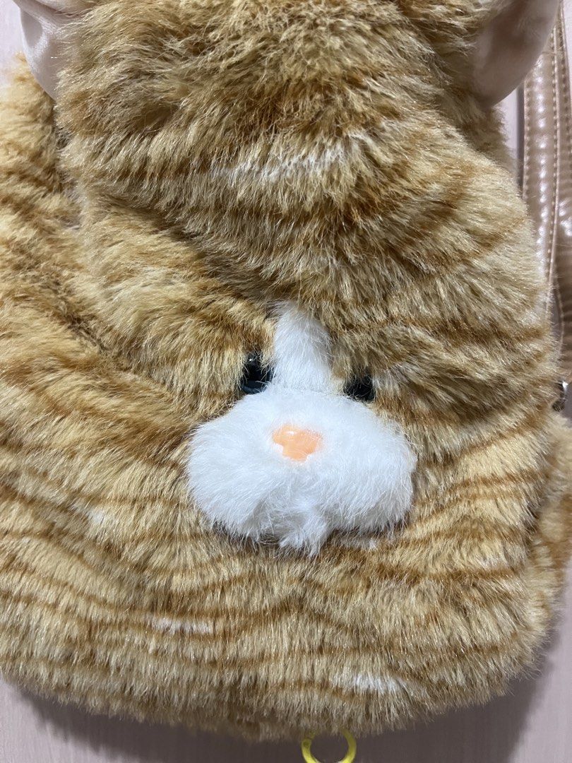 Cat plush shoulder bag backpack | free shipping (Category: Shoulder Bags) located in Iloilo. Submitted by youronlinesister (Listing ID 1447050661, Image 3). Description: Cute cat plush bag convertible Pwede crossbody | shoulder bag and backpack So fluffy Light weight Spacious Flaw: tinahi ko ung straps sa body ng bag Kase para syang mapipigtas , patahi nyo na lang sa may sewing machine para pulido Price:P380 free shipping via J&T Mop: gcash .