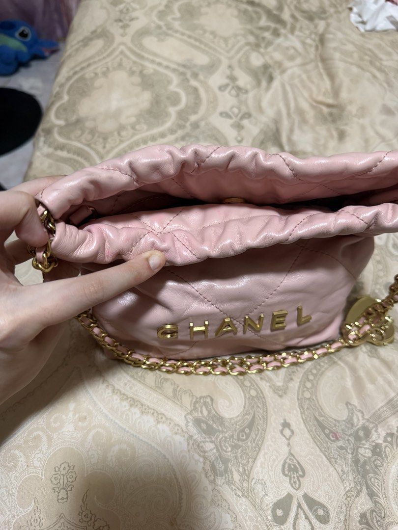 Chanel 22 Bag (Category: Luxury Bags & Wallets) located in Las Pinas. Submitted by closethaulsph (Listing ID 1447034230, Image 2). Description: -microchip - Quilted Leather with Gold Hardware - Features iconic Chanel logo in gold - Gold chain strap and Long body strap inside - Drawstring closure - Note: Minor scuffs , stains and signs of use present on leather, particularly on the bottom and sides as well as on the inside..
