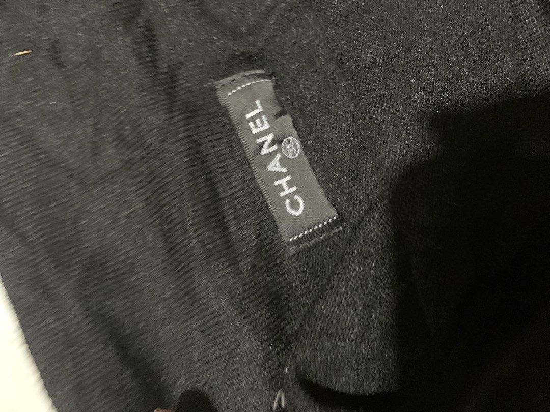 Chanel Black Shorts with Logo Waistband (Category: Luxury Apparel) located in Iloilo. Submitted by johnpullan30303 (Listing ID 1447076607, Image 3). Description: - Authentic Chanel black shorts - Features iconic Chanel logo on elastic waistband - Drawstring closure for adjustable fit - Made from comfortable fabric - Ideal for lounging or casual wear.