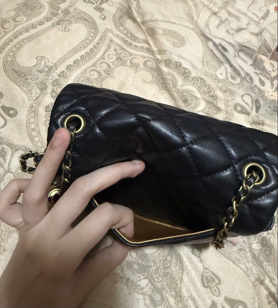 Chanel Pearl Crush Flap (Category: Luxury Bags & Wallets) located in Las Pinas. Submitted by closethaulsph (Listing ID 1447031866, Image 3). Description: coded negative screw Heavy pearl -For this specific model, the zipper hardware does NOT typically have a CC stamp underneath the slider/pull mechanism. Classic black quilted leather flap bag - Iconic Chanel CC logo clasp - Gold chain strap with unique ball charm detail - Lined gold interior with