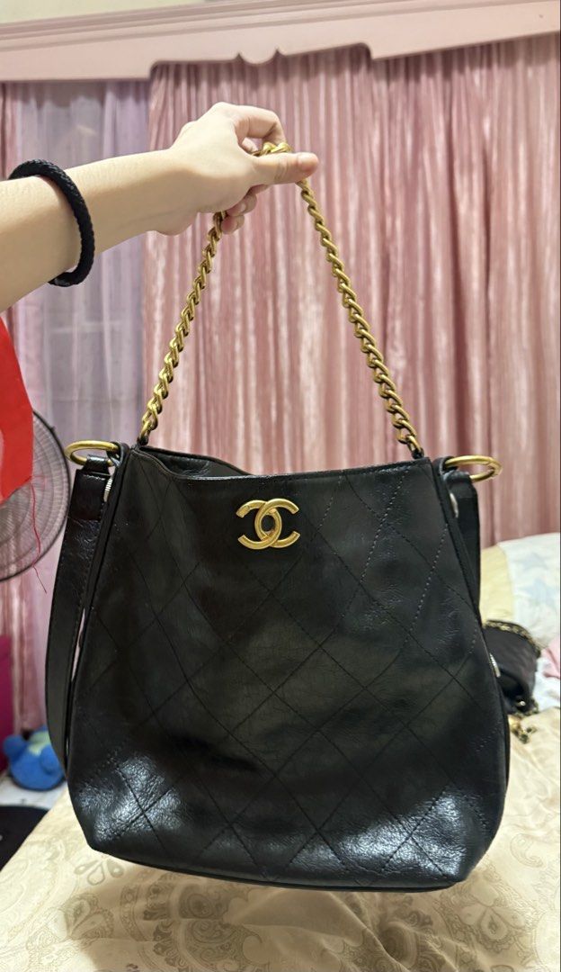 Chanel hobo Bag (Category: Luxury Bags & Wallets) located in Las Pinas. Submitted by closethaulsph (Listing ID 1447030058, Image 1). Description: Chanel 2019 Black Quilted Aged Calfskin Hobo Bucket Bag Looks so nice in person! coded - Chanel black leather shoulder /body bag - Material: Premium Diamond Quilted Aged Calfskin Leather - Made in France - Signs of wear on leather and hardware (please check photos for details) -Features: Chunky gold cha