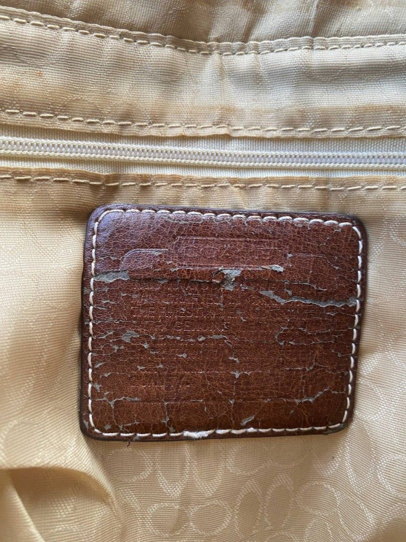 Coach Monogram Canvas & Leather Trim Tote Bag (Category: Luxury Bags & Wallets) located in Manila. Submitted by mordaxfinds (Listing ID 1447023271, Image 2). Description: - Authentic Coach monogram canvas tote - Classic brown leather trim and handles - Interior features multiple pockets for organization - Secure zip closure - Overall good pre-loved condition - Minor wear on interior leather tag - Very spacious, perfect for daily essentials.