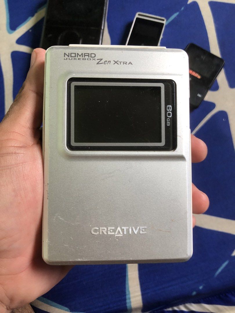 Defectives creative zen media players and mp3 (Category: Portable Music Players) located in Quezon City. Submitted by markgolveo (Listing ID 1446941837, Image 2). Description: Defectives creative zen media players and mp For parts out repairs Creative zen black ones signs of screen and body wears untested no charger Creative zen nomad tested before powers on not booting Small mp3 players small black one powers on and plays when plugged.