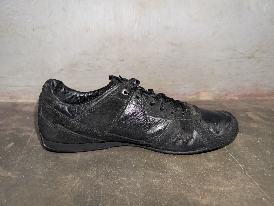 Diesel Black Leather Sneakers (Category: Casual Shoes) located in Calamba. Submitted by vnlaron (Listing ID 1447056755, Image 3). Description: Vintage Diesel Black Sneaker Size: Fits 7.5-8 US Men RFS: Too small.