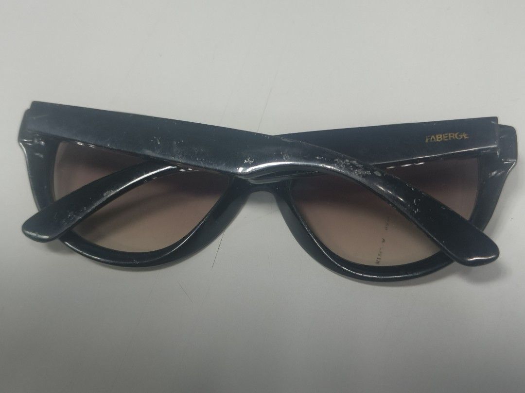 FABERGÉ Sunglasses Made in Italy (Category: Sunglasses & Eyewear) located in Manila. Submitted by bigtym.picker (Listing ID 1447002649, Image 2). Description: FOR SALE!!! VINTAGE FABERGE SUNGLASSES Price - 300 PESOS ONLY replaceable lens PLS SEE PIC FOR DETAILS. Selling all items AS IS PLS. manage your Expectation We accept shipping nationwide Meetup - BACOOR or near MOA - Stylish black cat-eye sunglasses - Gradient lenses - Made in Italy - Model