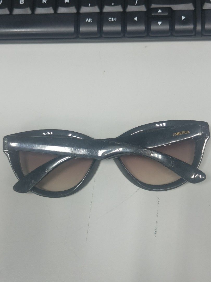 FABERGÉ Sunglasses Made in Italy (Category: Sunglasses & Eyewear) located in Manila. Submitted by bigtym.picker (Listing ID 1447002649, Image 3). Description: FOR SALE!!! VINTAGE FABERGE SUNGLASSES Price - 300 PESOS ONLY replaceable lens PLS SEE PIC FOR DETAILS. Selling all items AS IS PLS. manage your Expectation We accept shipping nationwide Meetup - BACOOR or near MOA - Stylish black cat-eye sunglasses - Gradient lenses - Made in Italy - Model