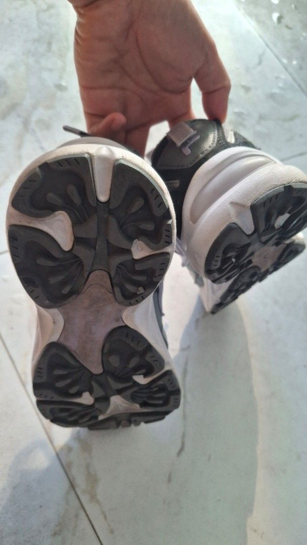 Fila Sneakers Grey White (Category: Sneakers) located in Quezon City. Submitted by _helpmedeclutter (Listing ID 1447013463, Image 2). Description: - Fila sneakers in grey and white - Classic lace-up closure - Perfect for everyday wear - Soles show some wear but retain good grip - Please check photos for detailed condition.