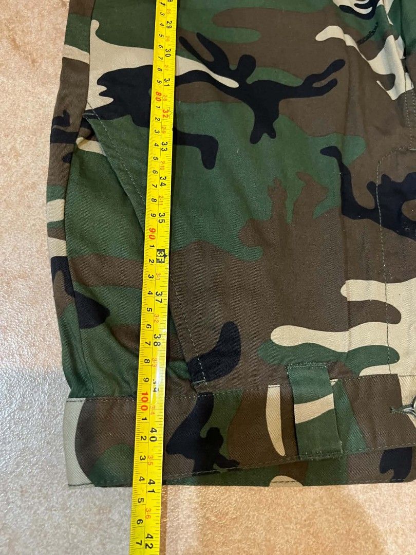Fingercrox Camouflage Cargo Pants Size XL (Category: Jeans) located in Pasig City. Submitted by ruincollections (Listing ID 1447083154, Image 2). Description: - Brand: Fingercroxx - Size: XL (for 36in waist) -41 inches length -Original Fingercrocx -in Prestine condition - Style: Woodland Camouflage Cargo Pants - Features: Classic camo pattern, multiple pockets, button closure - Condition: Great for casual wear or outdoor activities.