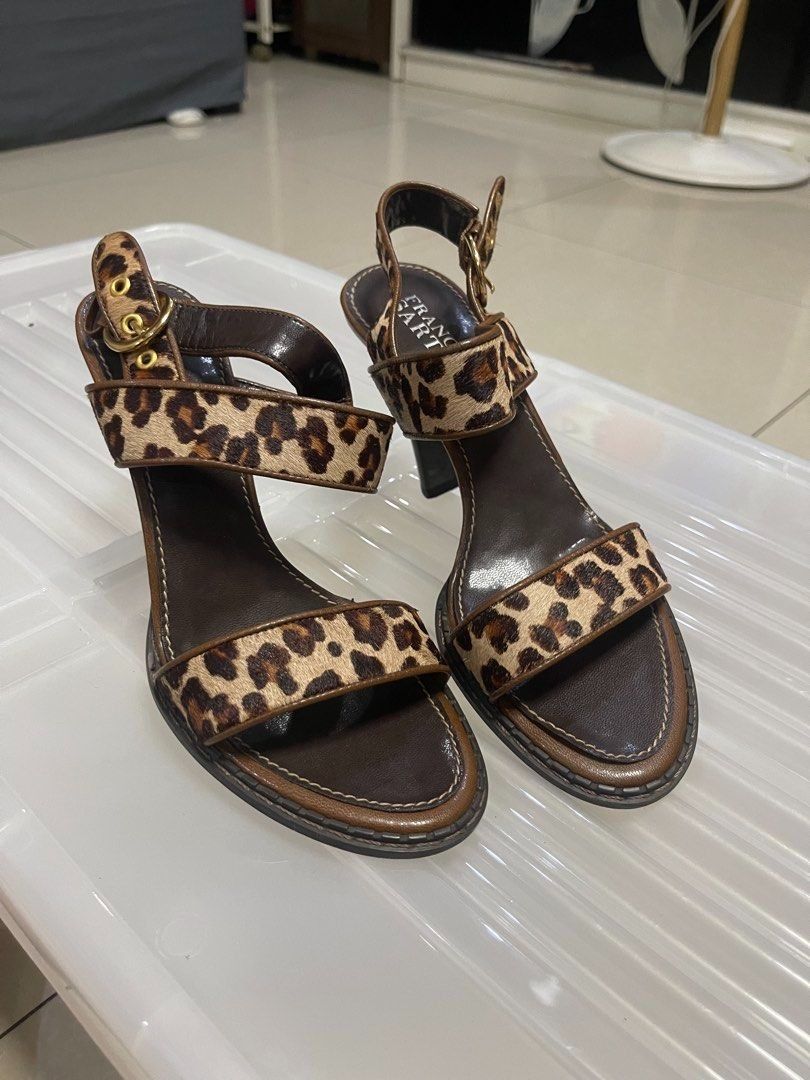 Franco Sarto Leopard Print Heeled Sandals (Category: Heels) located in Manila. Submitted by offtherack_mnl (Listing ID 1446928971, Image 1). Description: - Franco Sarto heeled sandals - Stylish leopard print strap detail - Adjustable buckle closure - Dark brown heel and sole - Size: 7.5M - Ideal for dressing up any outfit - 50% of the sales will help and support cancer patients.