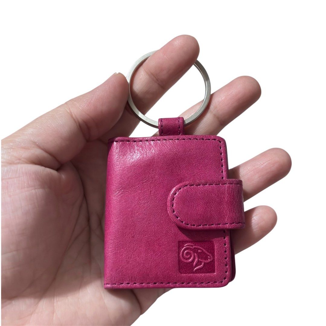 Genuine Leather Photo Holder Keychain (Category: Charms) located in Paranaque City. Submitted by dalle_closet (Listing ID 1447043479, Image 1). Description: genuine leather slightly used.