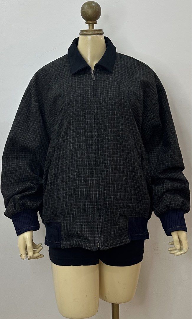 Gianni Valentino Italy Jacket (Category: Coats, Jackets and Outerwear) located in Mati. Submitted by vawixx2849032 (Listing ID 1447049816, Image 2). Description: - Classic Gianni Valentino jacket - Subtle all-over check pattern - Zip-up front with collar - Ribbed cuffs and hem - Ideal for layering - Made in Italy.
