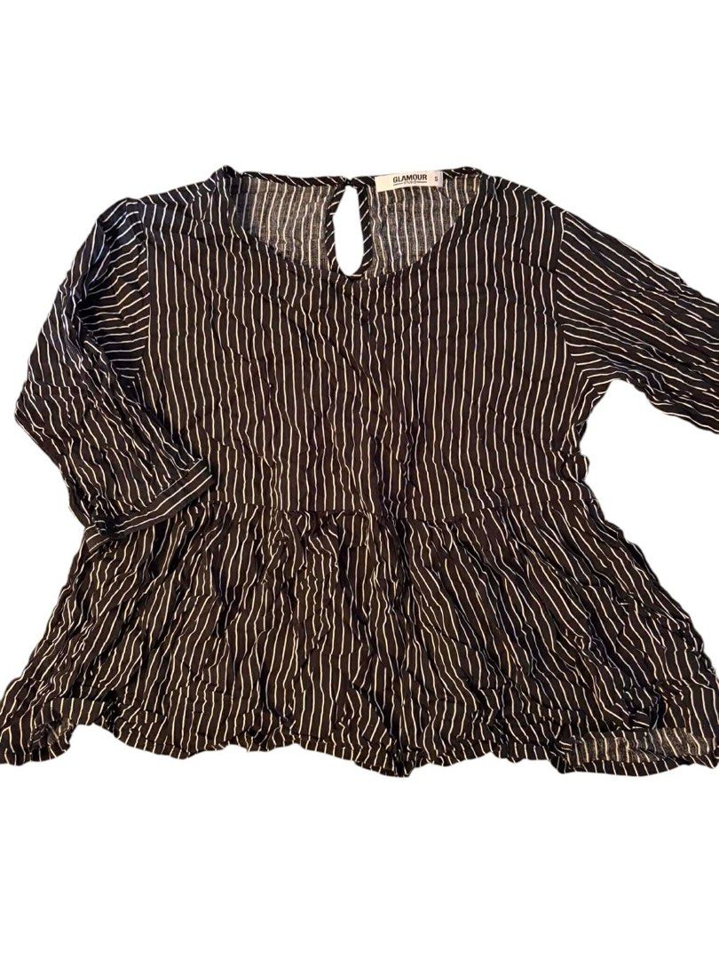 Glamour Studio Striped Peplum Top Size S (Category: Sleeveless) located in Baguio. Submitted by gabriyelo (Listing ID 1447053874, Image 1). Description: - Black and white striped peplum top - Brand: Glamour Studio - Keyhole detail at the back - 3/4 sleeves - Lightweight fabric - Perfect for casual or dressed-up looks.