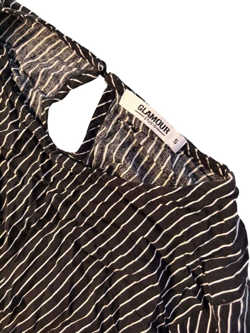 Glamour Studio Striped Peplum Top Size S (Category: Sleeveless) located in Baguio. Submitted by gabriyelo (Listing ID 1447053874, Image 3). Description: - Black and white striped peplum top - Brand: Glamour Studio - Keyhole detail at the back - 3/4 sleeves - Lightweight fabric - Perfect for casual or dressed-up looks.
