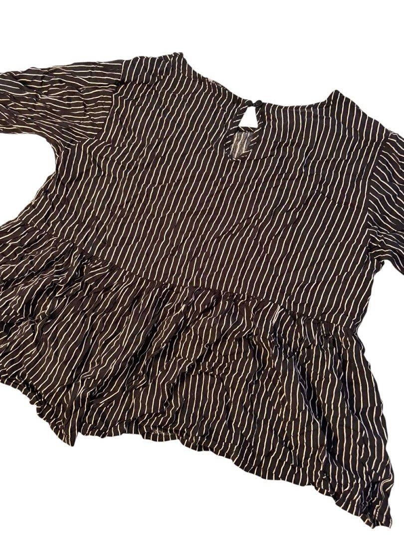 Glamour Studio Striped Peplum Top Size S (Category: Sleeveless) located in Baguio. Submitted by gabriyelo (Listing ID 1447053874, Image 2). Description: - Black and white striped peplum top - Brand: Glamour Studio - Keyhole detail at the back - 3/4 sleeves - Lightweight fabric - Perfect for casual or dressed-up looks.