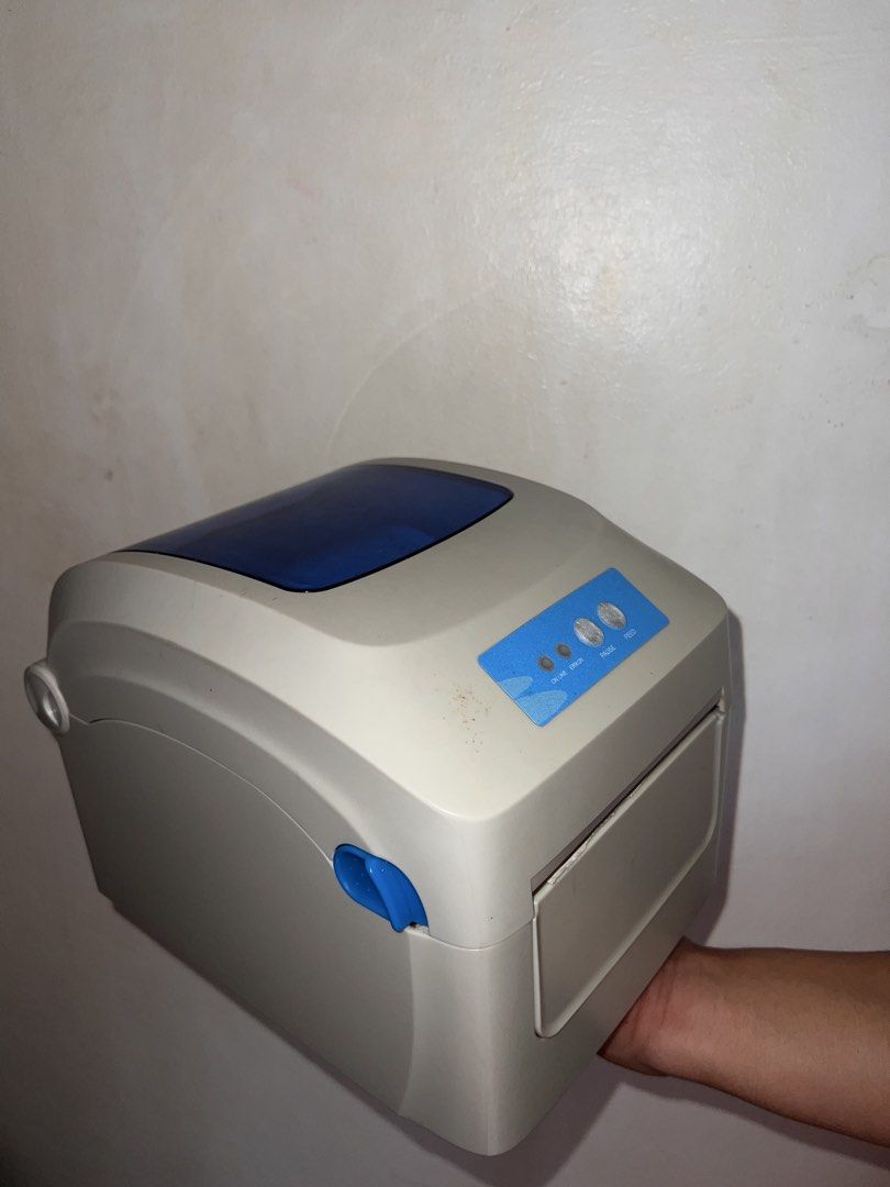 Gprinter waybill printer with j&t express rolls (Category: Printers, Scanners & Copiers) located in Marilao. Submitted by angelthangsxoxo (Listing ID 1446984418, Image 1). Description: -Includes a roll of J&T Express labels. -Has ON LINE, ERROR, PAUSE, and FEED buttons. -Power switch at the back. USB and power ports visible. - NO CABLE/ WIRE INCLUDED.