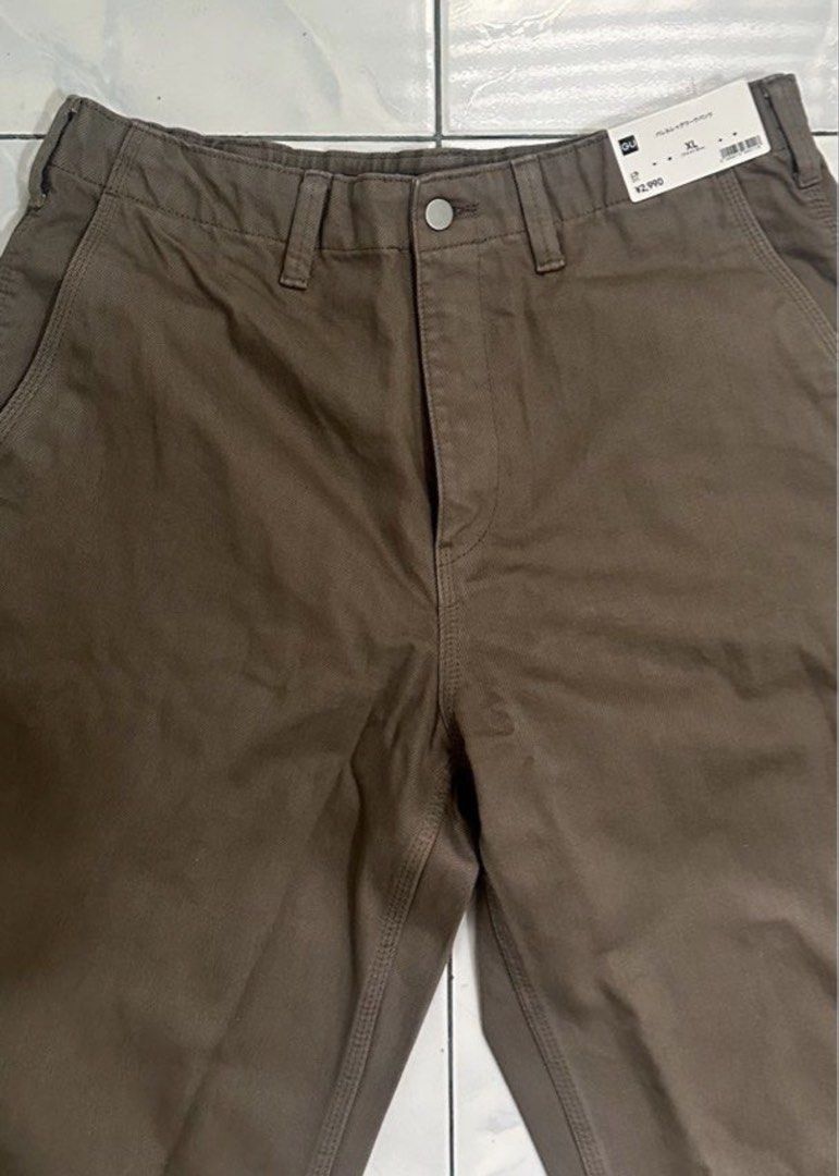 GU Wide Fit Work Pants - Brown - Size XL (Category: Jeans) located in Taguig. Submitted by snowcheese24chicken (Listing ID 1447104536, Image 2). Description: - Uniqlo Work Pants - Color: Brown - Style: Wide Fit - Size: XL - Condition: Brand new with tags, never worn RFS: Wrong size Slightly negotiable Actual Measurements: W: 34” L: 41”.