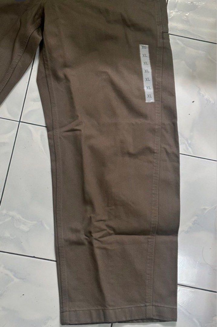 GU Wide Fit Work Pants - Brown - Size XL (Category: Jeans) located in Taguig. Submitted by snowcheese24chicken (Listing ID 1447104536, Image 3). Description: - Uniqlo Work Pants - Color: Brown - Style: Wide Fit - Size: XL - Condition: Brand new with tags, never worn RFS: Wrong size Slightly negotiable Actual Measurements: W: 34” L: 41”.