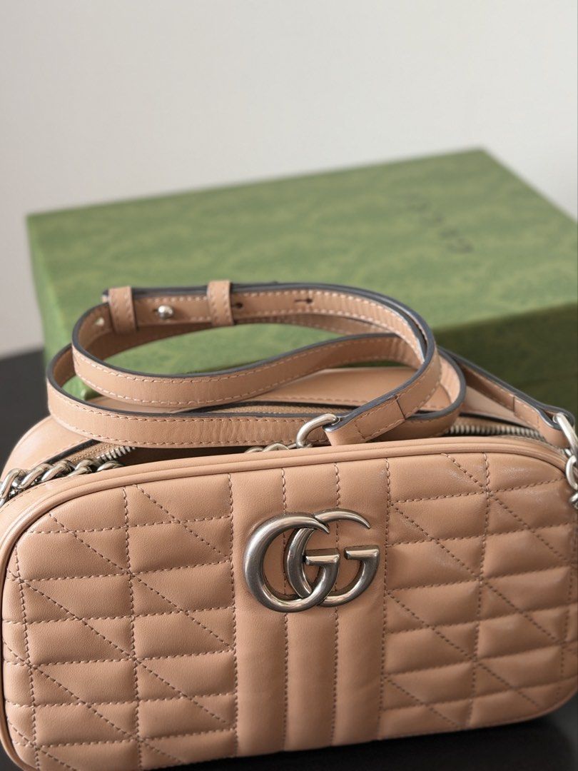 Gucci GG Marmont Matelassé Camera Bag (Category: Shoulder Bags) located in Makati City. Submitted by aesu24 (Listing ID 1446975193, Image 3). Description: Price: ₱38,000 Selling my Gucci GG Marmont Matelassé Camera Bag in Nude/Beige with silver-tone hardware. Condition: 9/10 * Exterior is in excellent condition * Clean corners with minimal signs of use * Hardware has light hairline scratches from normal wear * Interior has minor ink/color transfe