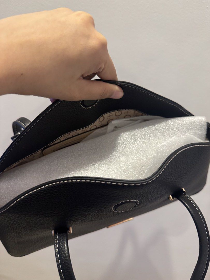 Guess Black Pebble Leather Shoulder Bag with Tag (Category: Shoulder Bags) located in San Pablo. Submitted by simplicitybeaute (Listing ID 1447055751, Image 3). Description: - Black Guess shoulder bag - Pebble leather texture - White contrast stitching - Gold hardware details - Comes with original tag and charm - Clean interior - Ideal for everyday use.